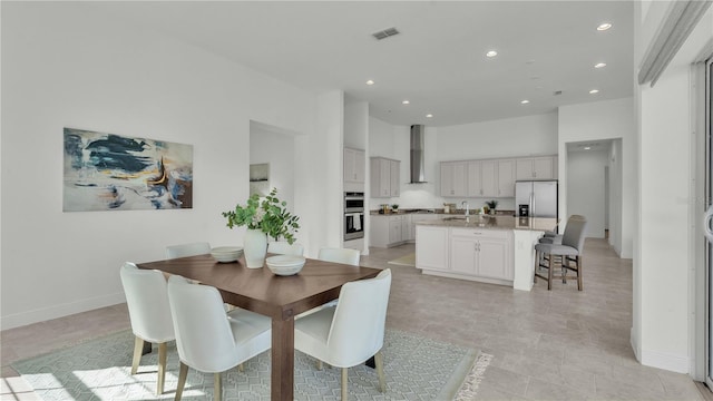 dining area featuring sink