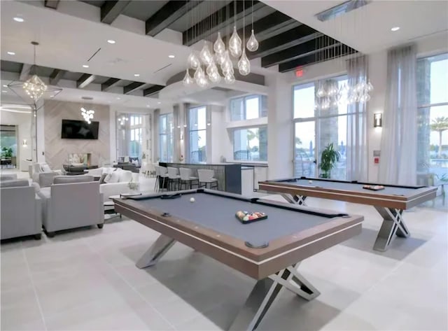 playroom featuring beamed ceiling, light tile patterned flooring, and pool table