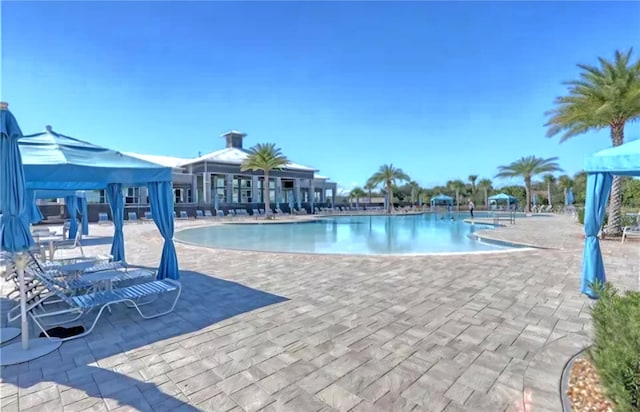 view of pool with a gazebo and a patio area