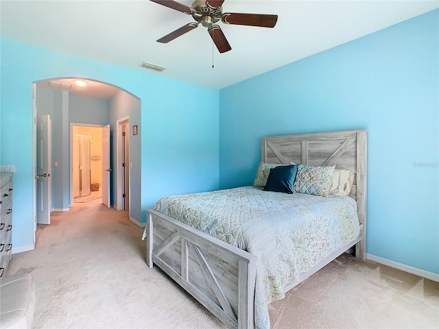 bedroom with light colored carpet and ceiling fan