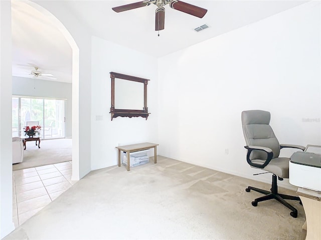 tiled office with ceiling fan