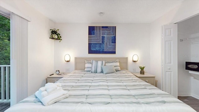 bedroom featuring wood-type flooring