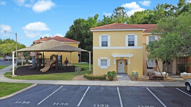 view of front facade featuring a playground