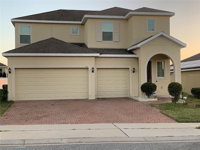 view of front of home featuring a garage