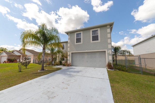 view of front of property with a front lawn and a garage