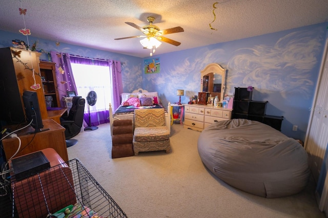 carpeted bedroom with a textured ceiling and ceiling fan