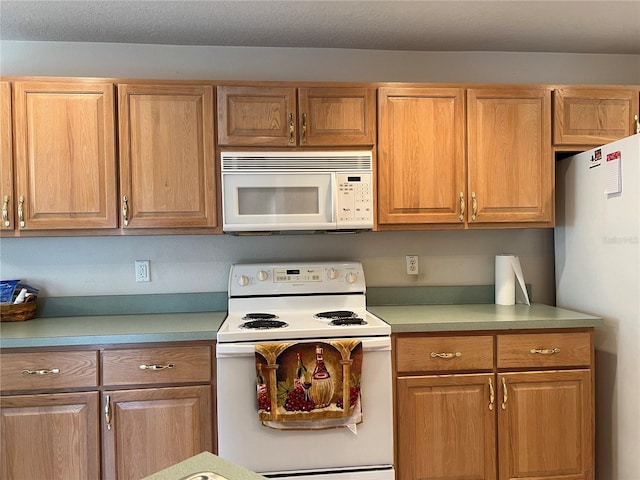 kitchen with white appliances