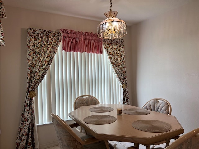 dining room featuring a chandelier