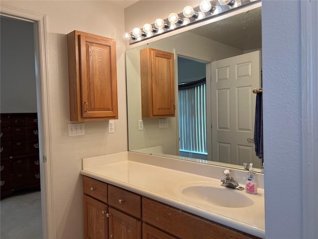 bathroom featuring large vanity