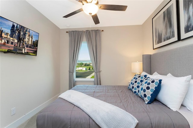 bedroom with ceiling fan and carpet