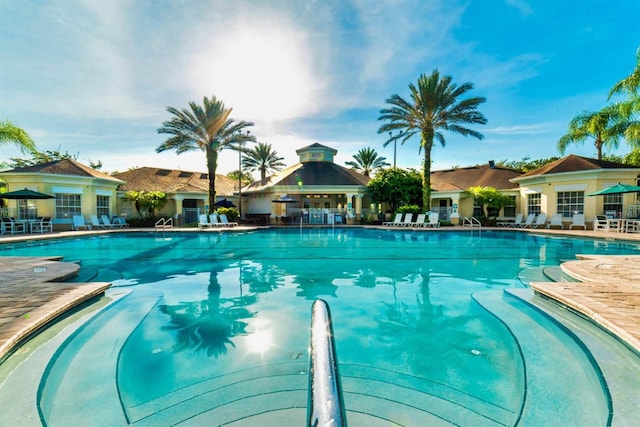 view of swimming pool with a gazebo and a patio area