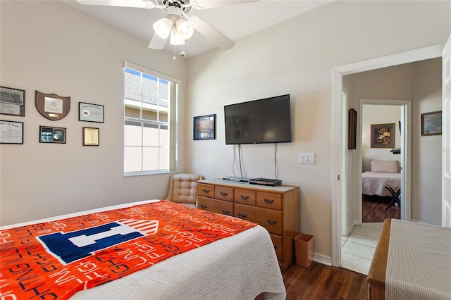 bedroom featuring ceiling fan and dark hardwood / wood-style floors