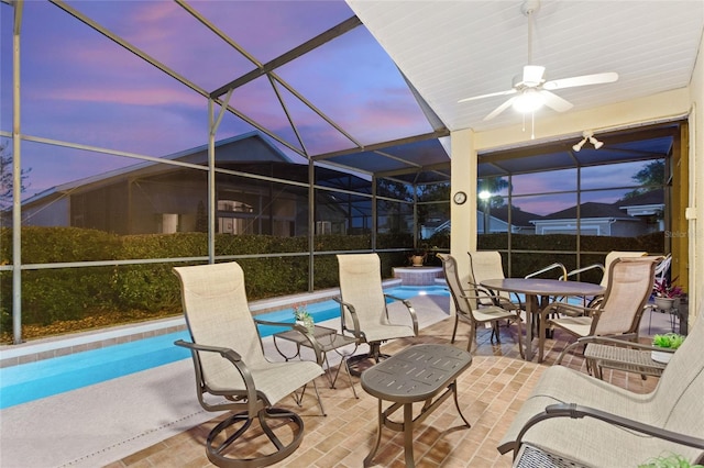 exterior space featuring ceiling fan and a lanai