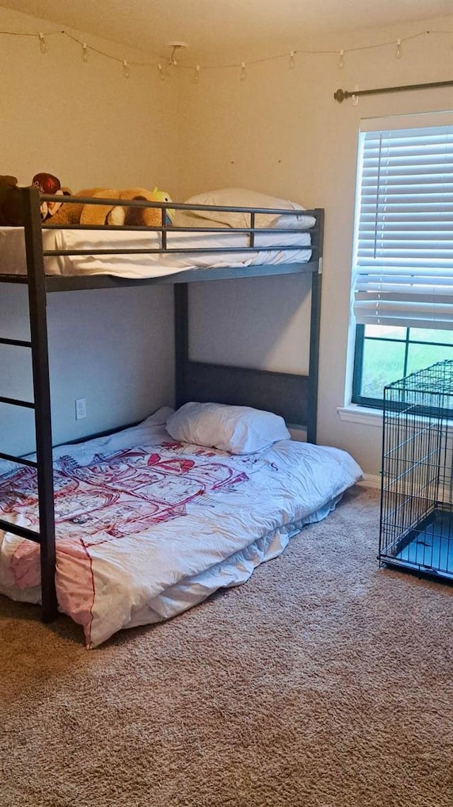 bedroom featuring carpet flooring