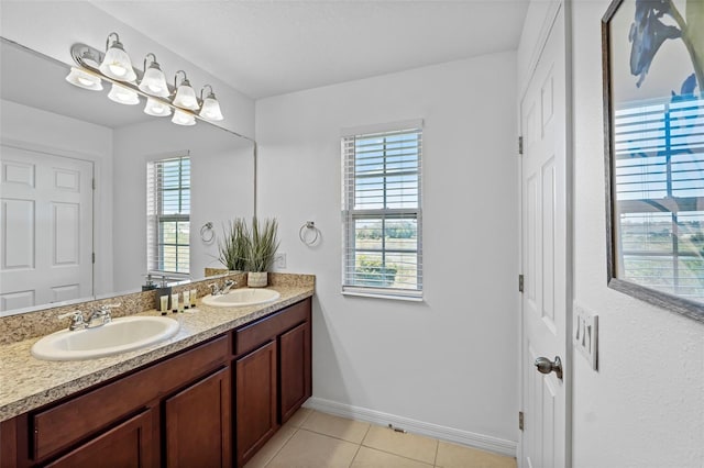 bathroom featuring tile floors and double vanity