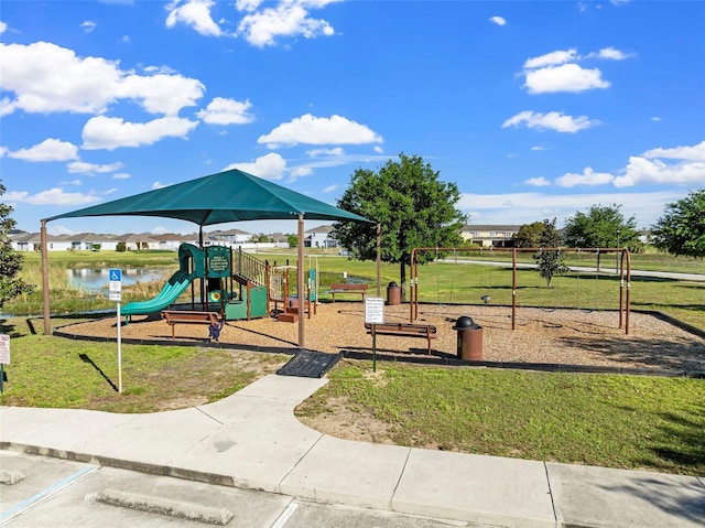 view of playground featuring a lawn