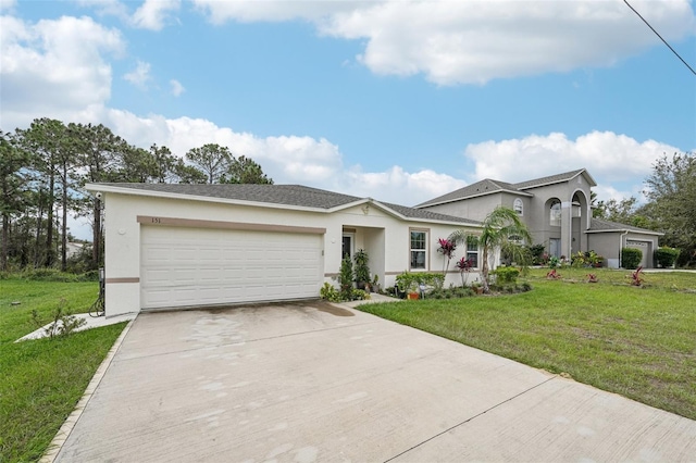 ranch-style house featuring a garage and a front yard