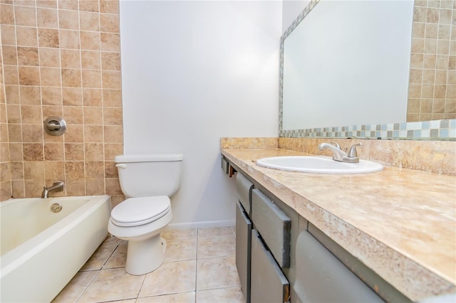 full bathroom featuring tile patterned flooring, tiled shower / bath combo, toilet, vanity, and tile walls