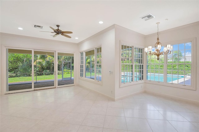 unfurnished room with visible vents, crown molding, and baseboards