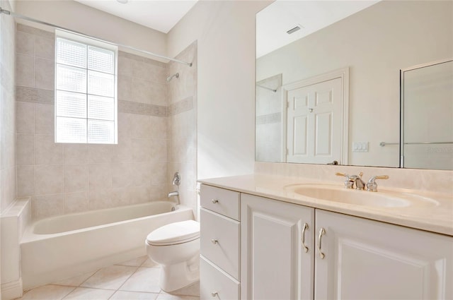 full bathroom featuring shower / washtub combination, visible vents, toilet, vanity, and tile patterned floors