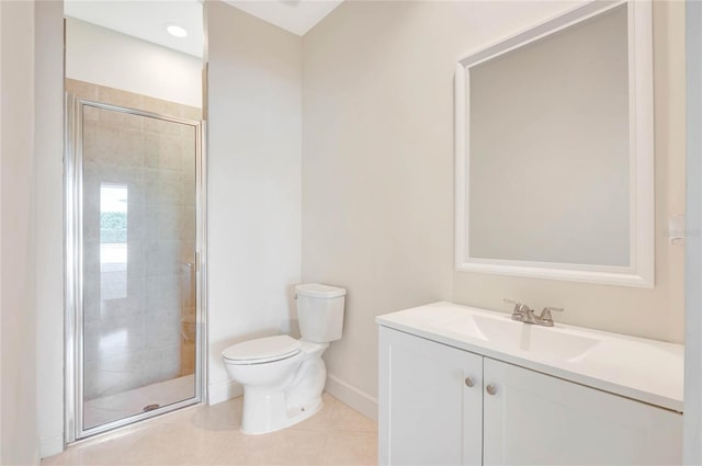 full bath featuring a shower stall, baseboards, vanity, and toilet