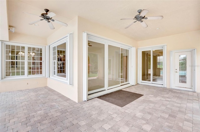 view of patio / terrace featuring ceiling fan