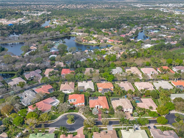 aerial view with a water view and a residential view