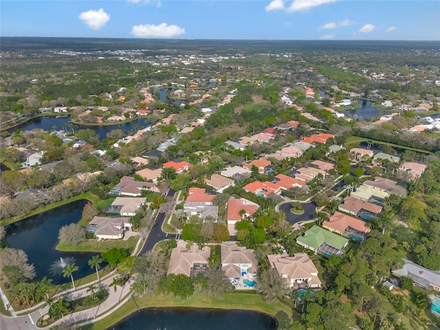 aerial view with a water view and a residential view