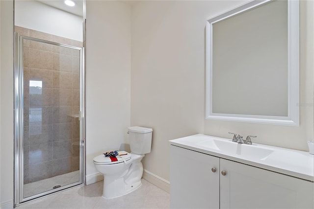 bathroom featuring baseboards, tile patterned flooring, a stall shower, and toilet