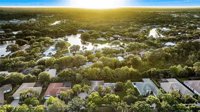 bird's eye view with a water view and a residential view