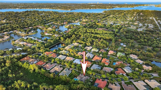 aerial view with a residential view and a water view