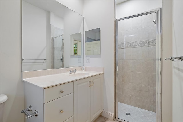 full bathroom featuring vanity, toilet, and a stall shower
