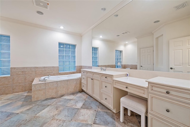 bathroom featuring visible vents, ornamental molding, a bath, and vanity