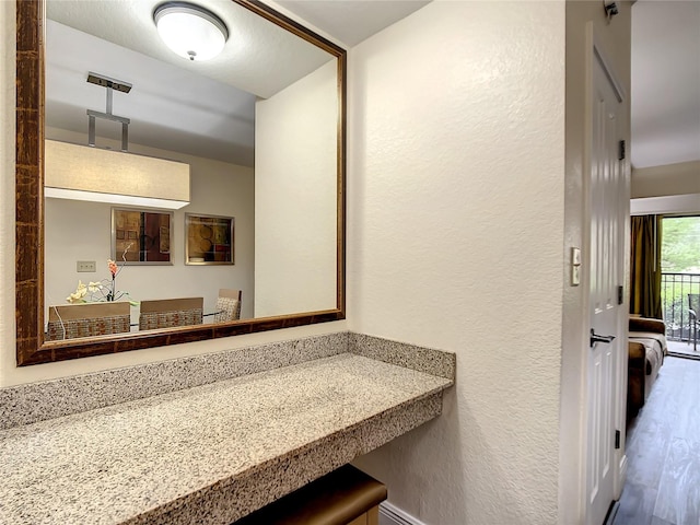 bathroom featuring wood-type flooring