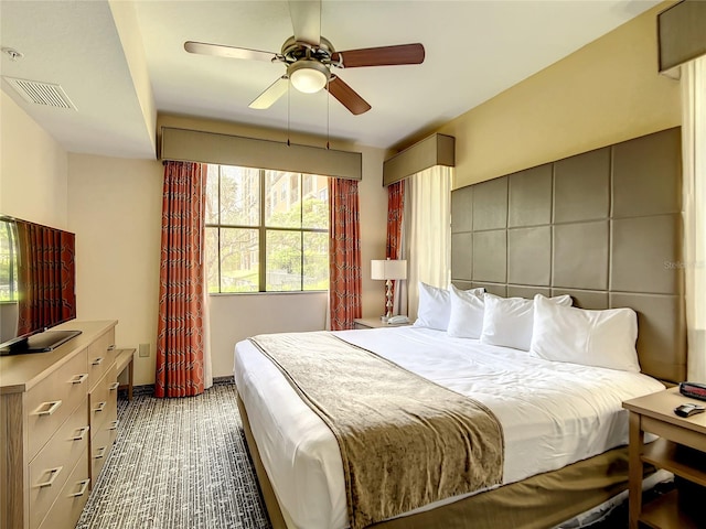 bedroom featuring ceiling fan