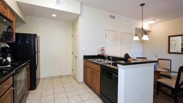 kitchen with sink, light tile floors, hanging light fixtures, black appliances, and a notable chandelier