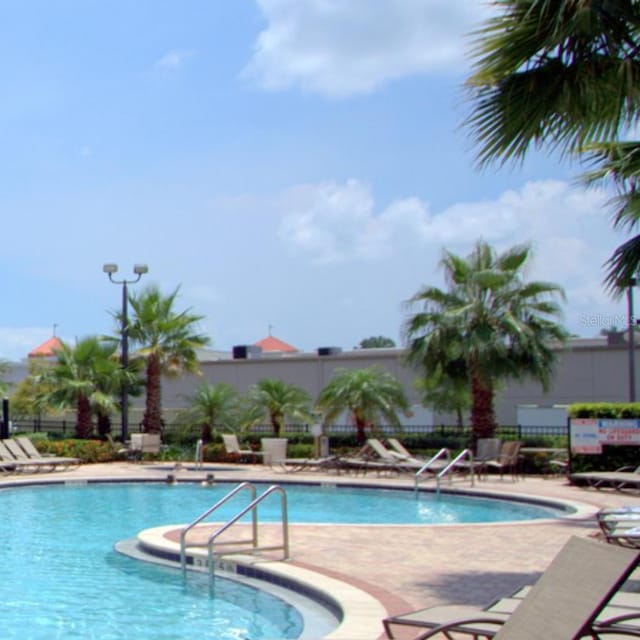 view of swimming pool featuring a patio