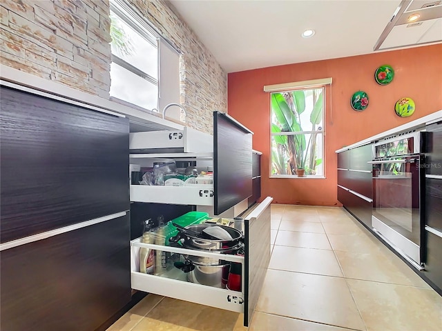 kitchen with light tile floors