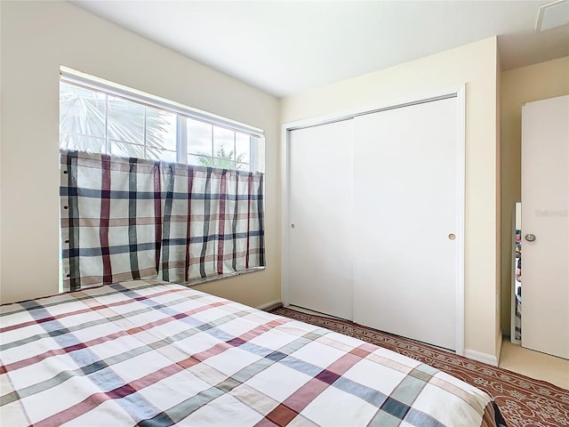 unfurnished bedroom with a closet