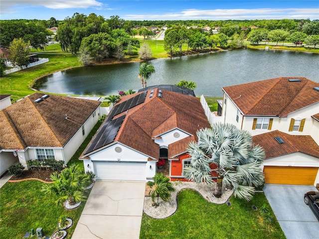 birds eye view of property featuring a water view