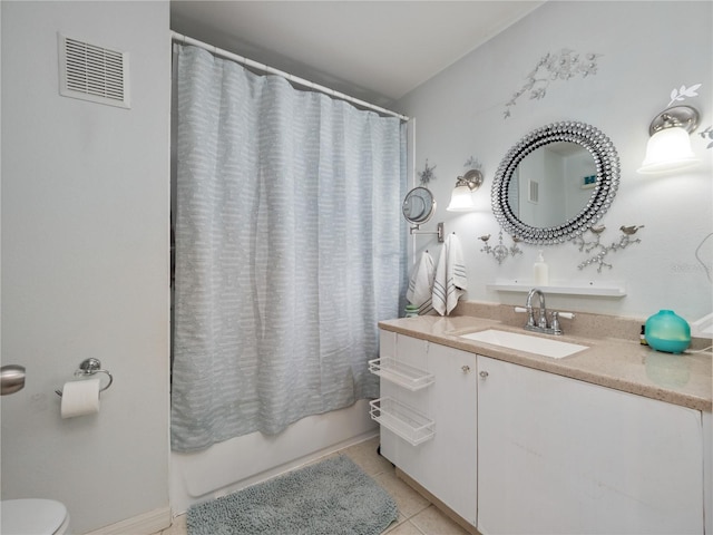 full bathroom featuring tile patterned floors, vanity, shower / bath combo, and toilet