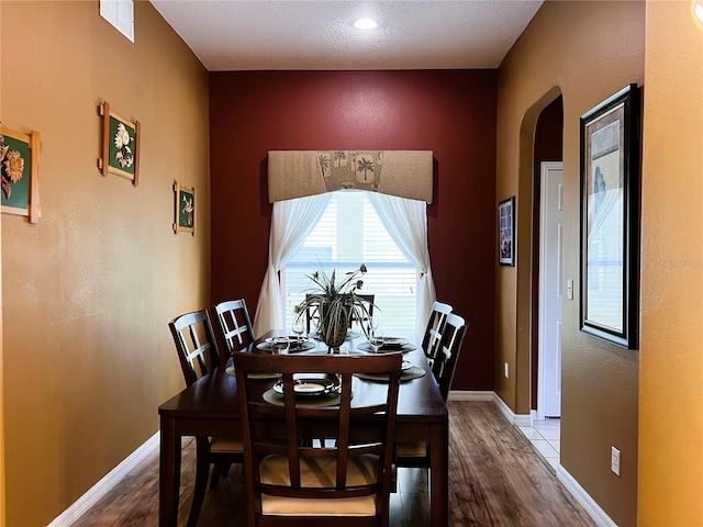 dining space featuring light hardwood / wood-style floors