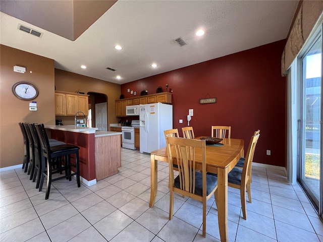 view of tiled dining space