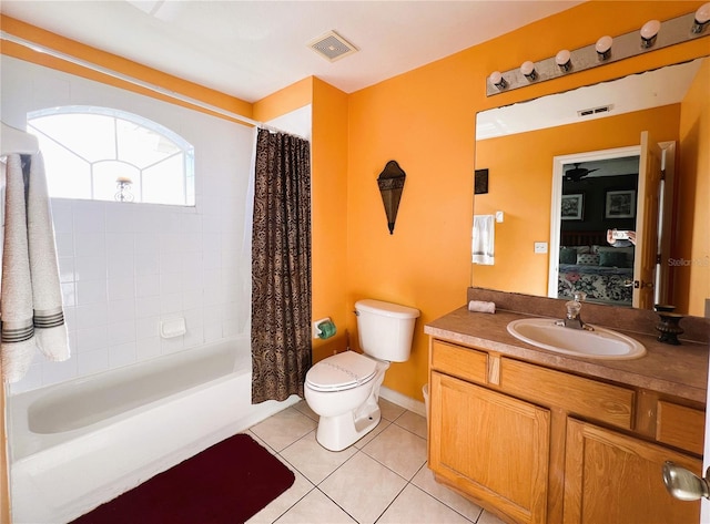 full bathroom with toilet, ceiling fan, vanity with extensive cabinet space, tile flooring, and shower / bathtub combination with curtain