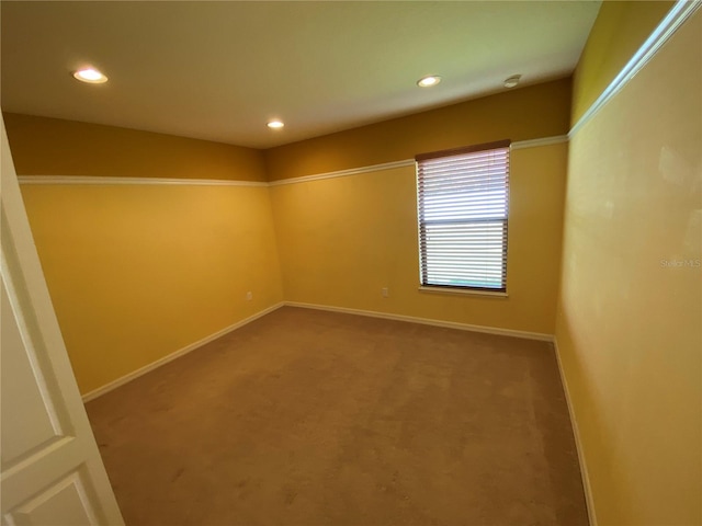 empty room featuring carpet flooring