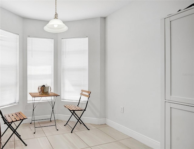 living area with light tile floors