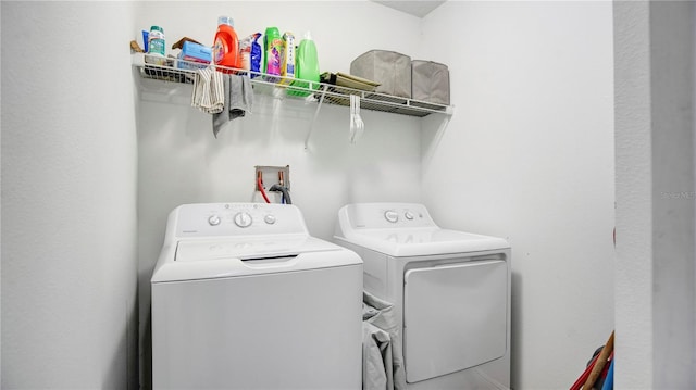 laundry room with washer hookup and separate washer and dryer