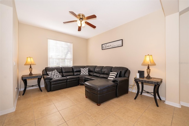 tiled living room with ceiling fan