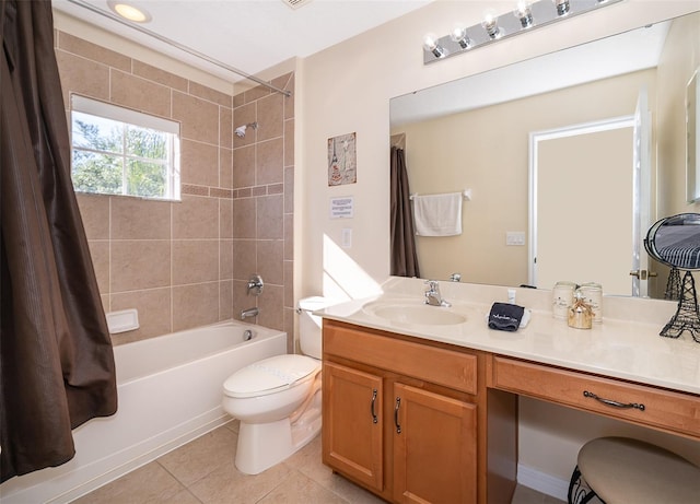 full bathroom with toilet, tile flooring, vanity, and shower / tub combo with curtain