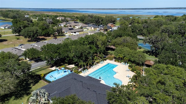 drone / aerial view with a water view